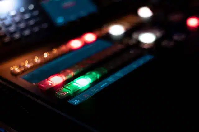 Zoomed in view of a light and sound board during event production at DreamOn Studios.